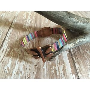 Antique Copper Colored Metal Butterfly on Pastel Colored Cotton Cord